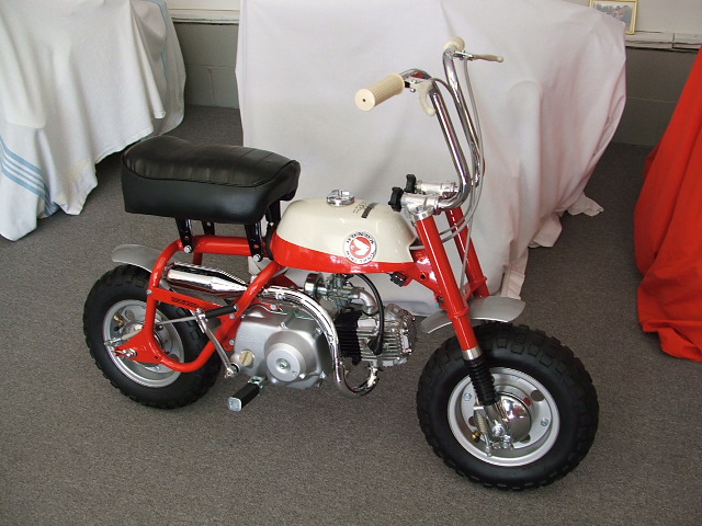 1968 Honda Z50 KO "Slant Guard"  
This bike was restored in 04'. It a early slant guard model. It is one of the first 1,000 built. Frame # 100992. Motor # 100988. It has the original Nitto tires and tubes, correct 8-panel seat, early high handlebars, original tank emblems (NOT REPRO!) NOS white grips (NOT REPRO!) NOS on/off switch and more. It was great to restore this bike to its past glory! It is the pride of my fleet. Has appeared in a few magazines. 
