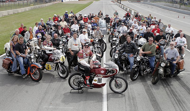 AMA Vintage Days,  85th Anniv. Parade Lap.  My 1970 Lady Dax was picked for the event.  Pictured on left side of photo.
You see me and the Dax - left side - about half-way back.
