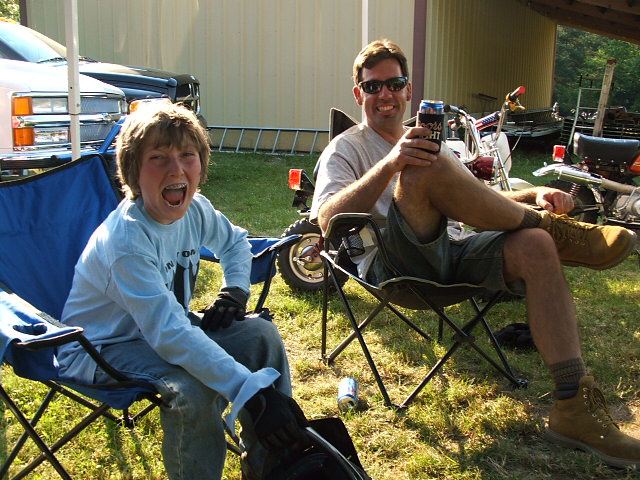 Kerry and Nathan relax at the Team Hospitality Tent.  Only VIP for the boys!  Nathan screams for the waitress for another beverage!
