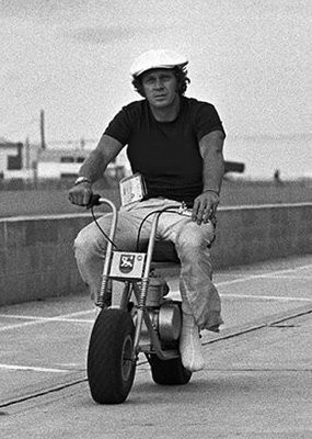 The man.  Steve McQueen cruzin the pits on his mini.
